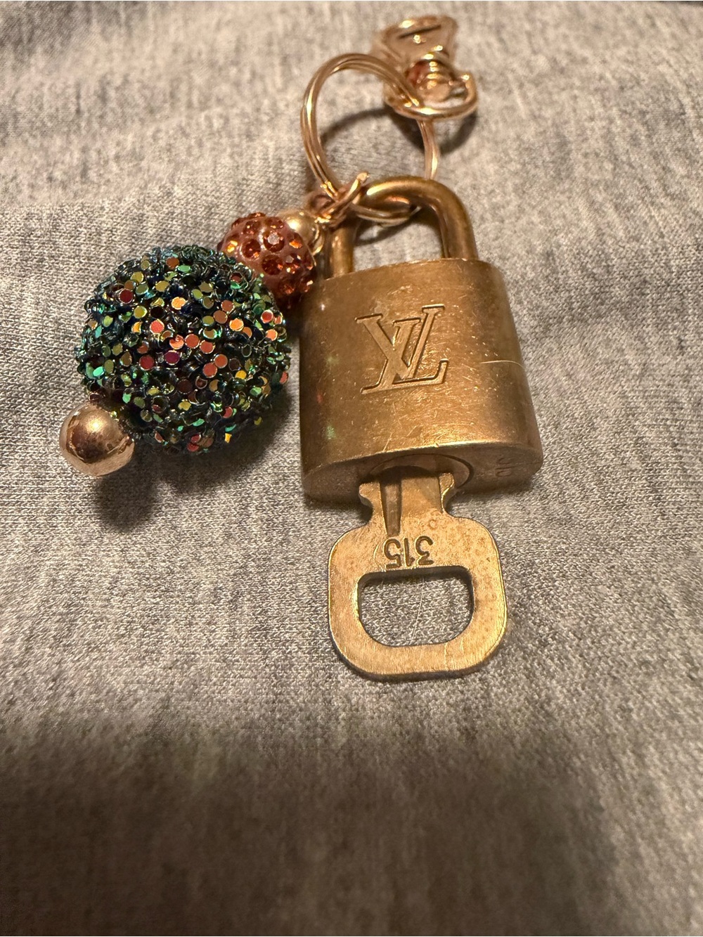 Louis Vuitton Gold Padlock Key Charm with Multicolor Glitter Beads